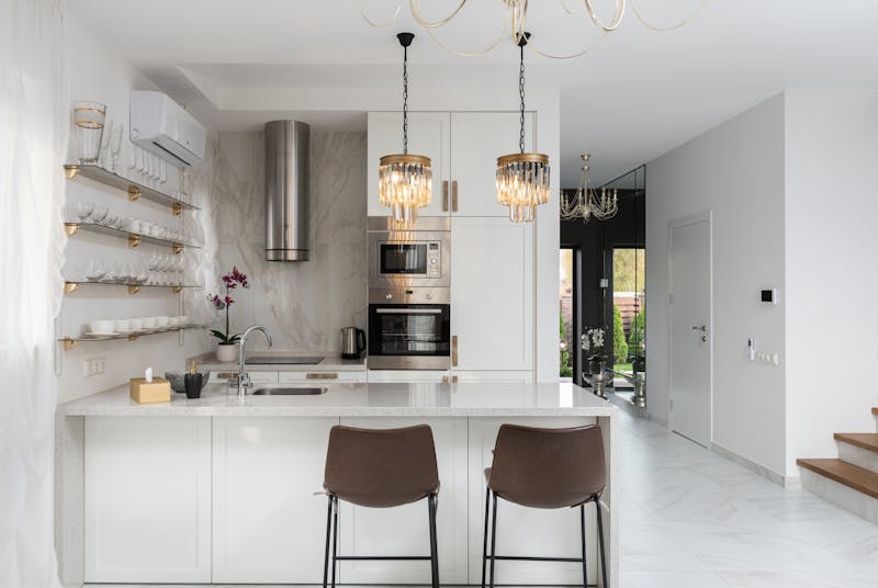 Modern kitchen with pendant lights in Corona