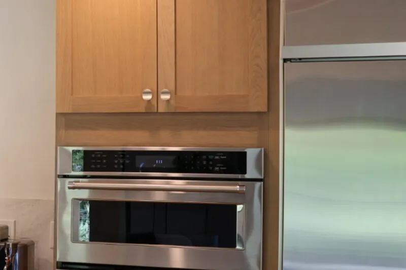 Modern kitchen with pendant lights in Corona
