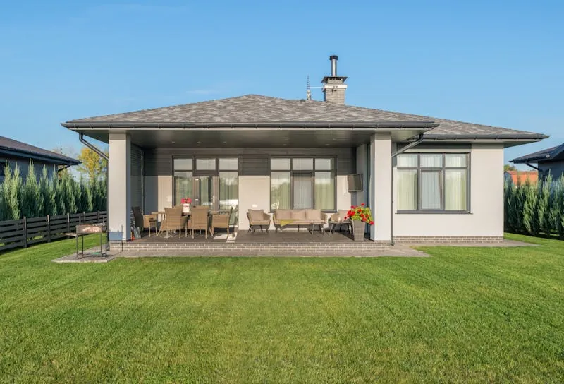 Lawn and patio with landscaping
